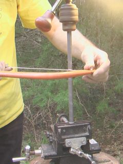 Cutting tube with hacksaw in drill press