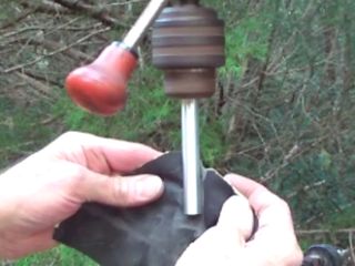 Tube is sanded with 400-grit as it spins